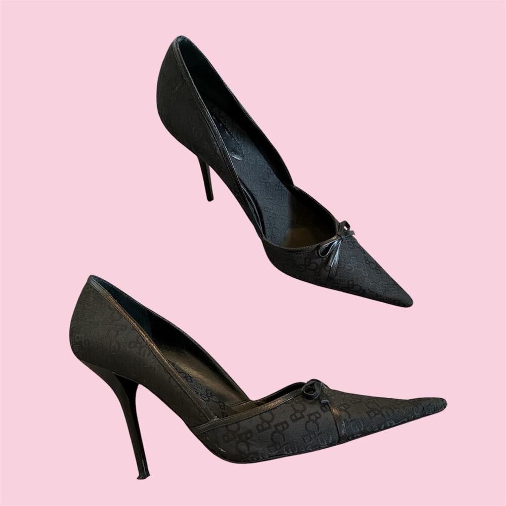 BCBGirls Black leather pumps with repeating monogram pattern